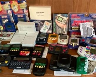 HALF OFF !  $20.00 now, was  $40.00.......Tons on mini hand held games lot 