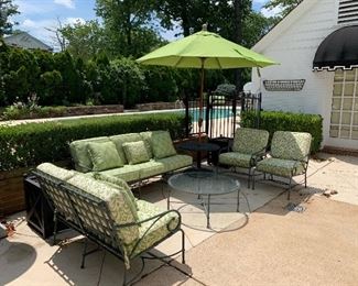 $2000. Luxury patio furnishings by Brown Jordan designs. Cushions by Frontgate. 5 Piece set includes sofa, loveseat, glass top table and two chairs. (UMBRELLA SEPERATE) 
