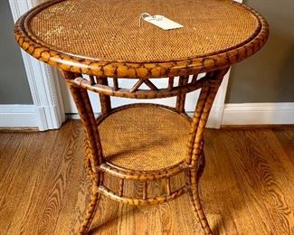 $150 - Rattan Side Table (AS IS - worn on table top) - Measures 28” diameter x 29” tall
