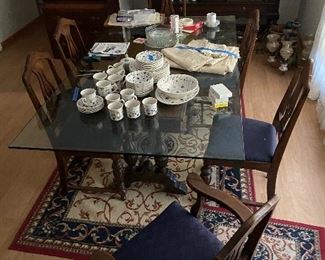 Antique dining room table with 6 chairs and added glass top