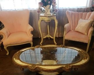 several vintage pink velvet side chairs, gold coffee table