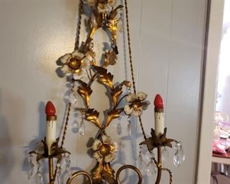 white metal flower sconces