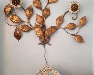 I love this large sconce, the flowers light up!