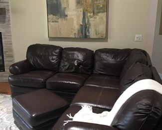 Dark Chocolate leather sectionals with Ottoman  $2000