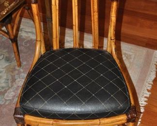 SET OF FOUR STUNNING PIERCE MARTIN LEATHER BOUND RATTAN DINING CHAIRS WITH LEATHER SEATS. OUR PRICE $1600.00 FOR THE SET  