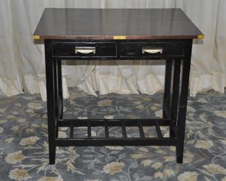 DROP LEAF MAHOGANY BROWN BREAKFAST TABLE WITH TWO DRAWERS AND LOWER SHELF FROM PIER 1. THERE ARE BRASS FITTINGS ALONG THE TOP. 35.5" W x 14"D x 31"H. WHEN OPENED, THE TABLE INCREASES TO 28". OUR PRICE IS $200.00.  