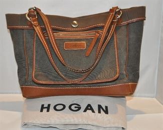 BROWN CANVAS AND CARMEL LEATHER HOGAN HANDBAG WITH DOUBLE STRAPS AND FRONT POCKET IN EXCELLENT CONDITION (WITH DUST BAG), 12"W X 9"H X 5.5"D. OUR PRICE $135.00