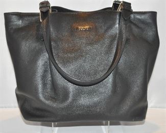 SUPER SOFT BLACK LEATHER TOD’S SHOULDER BAG WITH GOLD HARDWARE IN EXCELLENT CONDITION (INCLUDES DUST BAG). SIDE PLEATS ARE POCKETS AS WELL AS ONE INTERIOR POCKET. 11"W X 12"H X 6" D. OUR PRICE $225.00