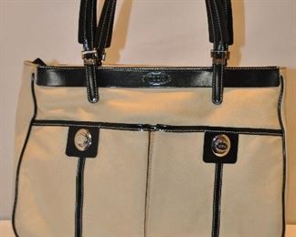 LIGHT BEIGE NYLON WITH BLACK PATENT LEATHER TRIM DOUBLE HANDLE TOD’S HANDBAG WITH SILVER TRIM IN GOOD CONDITION. 12.5” W X 9”H X 4.5”D.  OUR PRICE $95.00