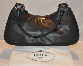 BLACK NAPPA LEATHER AUTHENTIC PRADA HANDBAG WITH SILVER HARDWARE IN EXCELLENT CONDITION! (INCLUDES DUST BAG). 13.5"W  X 8"H X 4.5"D. OUR PRICE $450.00