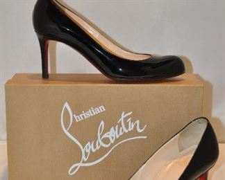 BLACK SIMPLE 70 PATENT LEATHER CHRISTIAN LOUBOUTIN PUMP IN VERY GOOD CONDITION WITH BOX. SIZE 37.5. OUR PRICE $265.00