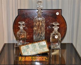 GREAT HOME DECOR INCLUDES: PAIR OF VINTAGE 8" GLASS DECANTERS($45.00PR), SET OF 4 VINTAGE BRASS & BLACK LIQUOR TAGS ($25.00 SET), 9.25" DECORATIVE BOX ($28.00), LARGE 13.25"  CUT GLASS  DECANTER ($30.00) AND A 19.5" X 14" CHARLES ROBERTS TRAY, AS IS, ($25.00)