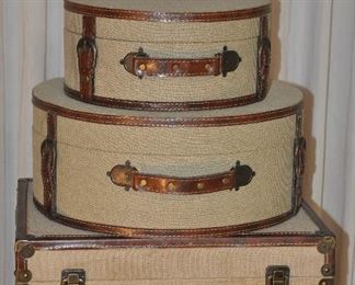 SET OF 3 VINTAGE DESIGN HINGED STORAGE BOXES WITH BROWN FAUX LEATHER TRIM. LARGEST CASE IS 13.25"H X7.5"D X 17"W. OUR PRICE $75.00