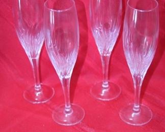 50% OFF, NOW $7.50                                                                   $15. Four champagne flutes.