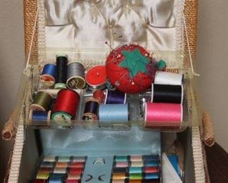 $15. Sewing box that is full of notions.