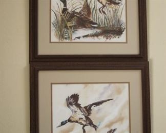 50% OFF, NOW $25 pair.                                                              $50 pair. Two framed pieces of duck artwork.