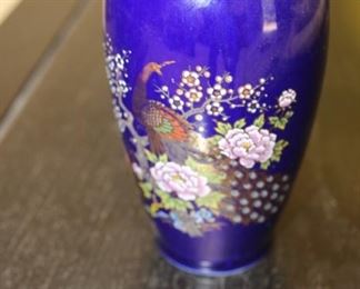50% OFF, NOW $4                                                                              $8. Asian vase. 8 inches tall.