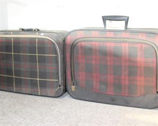 $45. Set of two soft top, zippered plaid suitcases. 