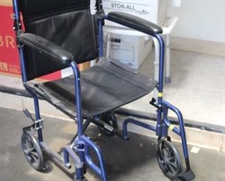 $50. Transport wheelchair. Folds for easy storing or in the car. Removable foot rests.