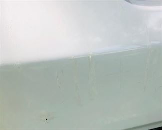 FEW SMALL BLEMISHES ON CAR BUMPER