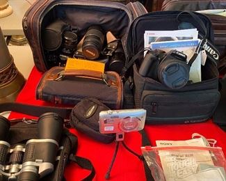Canon, Nikon, Sony cameras, binoculars 