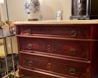 Antique marble top dresser. $875.00