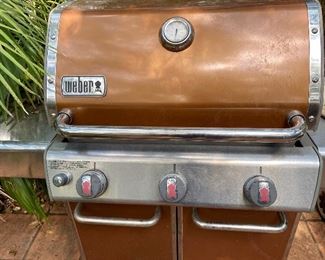 Weber Genesis 11 Series E315, less than a year old, very clean, hardly used, Copper color New cost about 800.00, our sale price 635.00 includes tank 