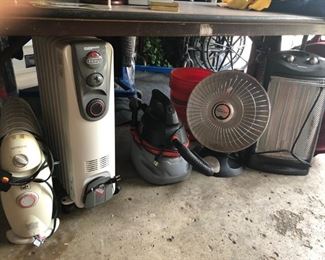 Many different heaters, tools  & shop vac's ect