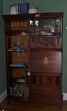 19th Century Secretary with beveled mirror and bowed glass