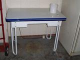 Enamel topped table with slide-out