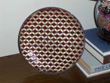 Red and gold decorative plate