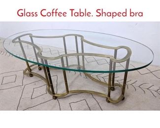 Lot 101 Oval MASTERCRAFT Brass Glass Coffee Table. Shaped bra