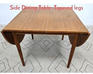 Lot 536 Danish Modern Teak Drop Side Dining Table. Tapered legs
