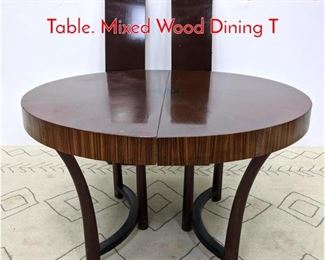 Lot 541 T.H RobsjohnGibbings Dining Table. Mixed Wood Dining T