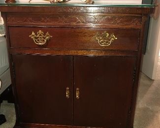 90.  Pair Hickory Chair, Carved Mahogany Night Stands with Brass Handles and Glass Top, $400.00