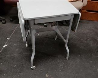 Small MCM Light Gray Painted Typing table stand on wheels        Measures Approx:  Opened 35.5"W x 14.5"D x 25.5"H   Closed 18.25"W x 14.5"D x 25.5"H  $85