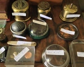 Stamp holders and paper weights