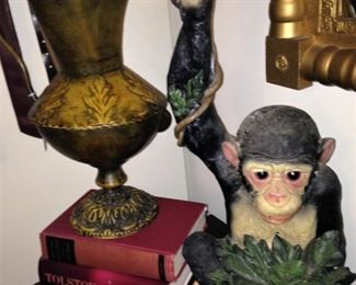 Urn, books, monkey