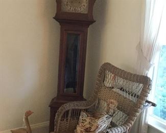 Antique grandfather clock with provenance and antique wicker wheelchair 