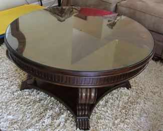 #36.  $125.00.  Round coffee table 20”h X 40” diameter