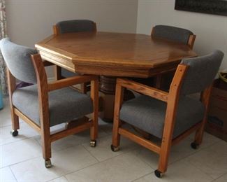 #54. $125.00. Game table with 4 chairs table is 30.5”h  X54” diameter