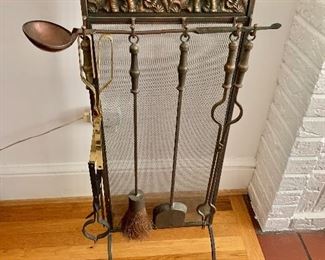 $150 Fireplace tool stand with elephant motif: 14" W, 36.5" H. 
