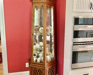 $150 Four sided glass cabinet. Approx 36" W, 77" H. 