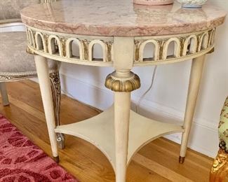 $150 Vintage marble-topped table. 26" D, 27.5" H. 