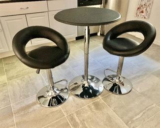 $250 for set of adjustable bar table and two adjustable stools: table top 24"D, 36" H. 
