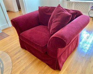 $250 Domain red velvet, oversized armchair: 54" W, 38" D, 32" H. 