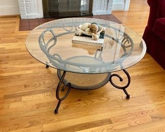 $150 Glass top table with brass plate base decor:  40" D, 20" H.  