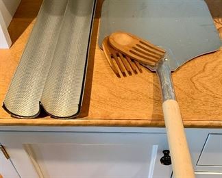 Aluminum Pizza Peel, Salad Tongs, and French Bread Pan: $28