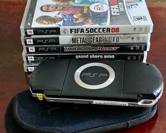 Item 140: PSP with 5 games: $125