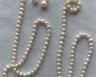 Jewelry 17: Very pretty long strand of pearls and earrings to match: $65